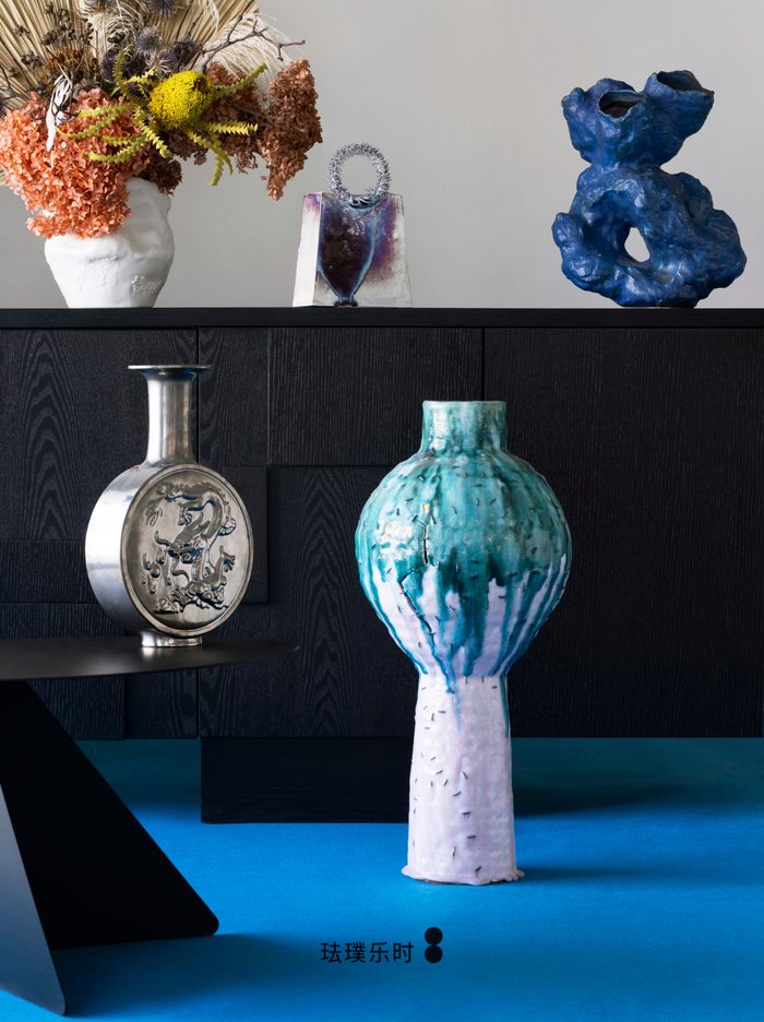 Contemporary Chinese ceramics on display — dark-toned selection